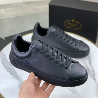 Prada Cloudbust काला मोनोक्रोम चिकना चमड़ा ऊपरी लाइफस्टाइल स्नीकर