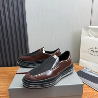 Prada Cloudbust بني أسود سليب أون جلد لامع و شبكي لوافر