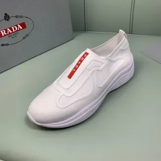 Zapatillas Lifestyle Prada blancas y rojas con parte superior de knit y cierre slip-on