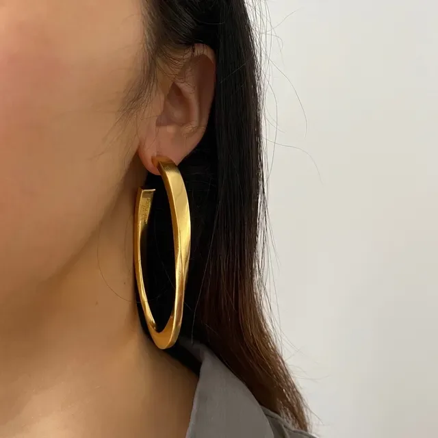 Saint Laurent Boucles d'oreilles aro twist or poli 3