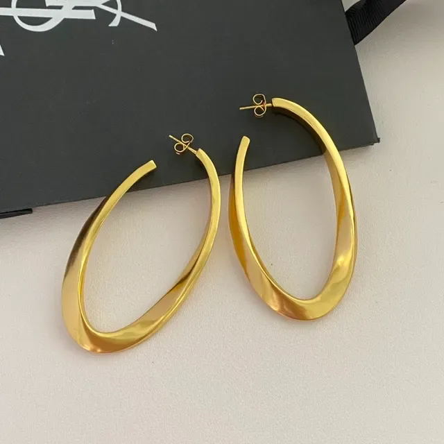 Saint Laurent Boucles d'oreilles aro twist or poli 5
