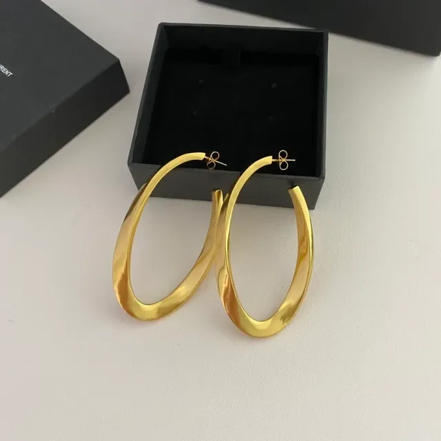 Saint Laurent Boucles d'oreilles aro twist or poli 7