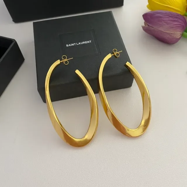 Saint Laurent Boucles d'oreilles aro twist or poli 8