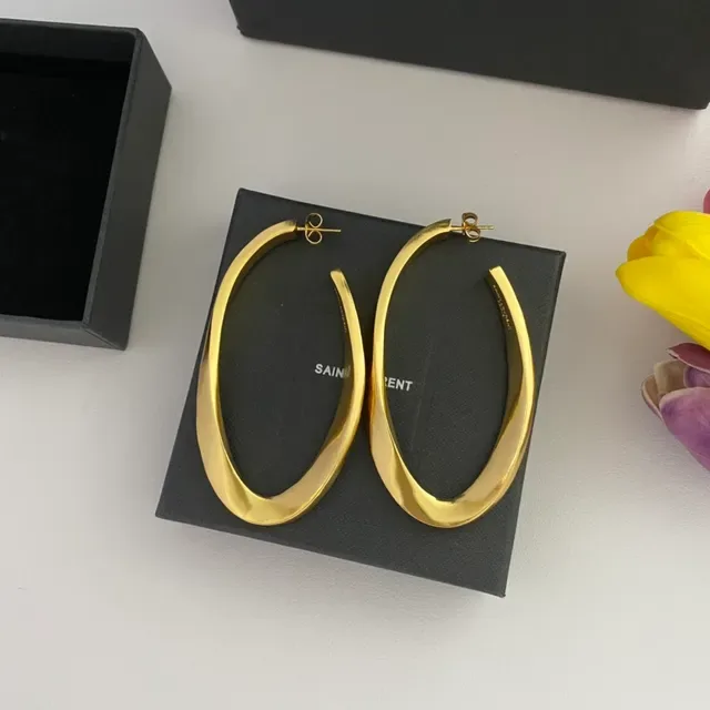 Saint Laurent Boucles d'oreilles aro twist or poli 9
