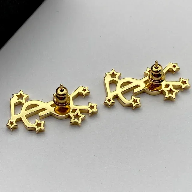 Saint Laurent YSL Stars Boucles d'oreilles à tige étoilées dorées 2