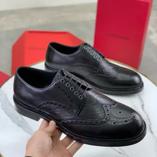 Salvatore Ferragamo Black Full Wingtip Embossed Logo Pattern Brogue