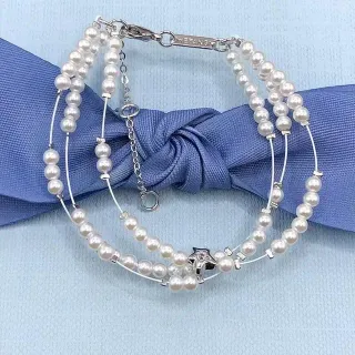 Tiffany & Co. Multi-Strand Cultured Pearl and Silver Star Charm Bracelet