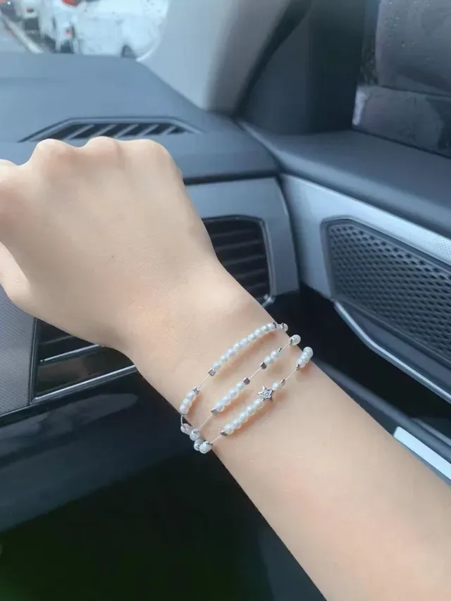 Tiffany & Co. Multi-Strand Cultured Pearl and Silver Star Charm Bracelet 6