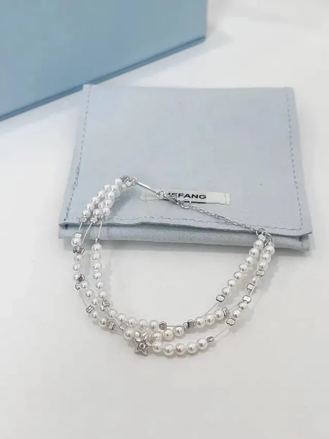 Tiffany & Co. Multi-Strand Cultured Pearl and Silver Star Charm Bracelet 8