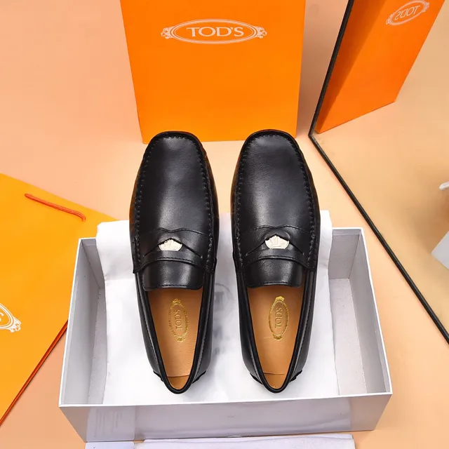 Tod's Horsebit Loafer Mocassim preto dourado de couro com fivela 3