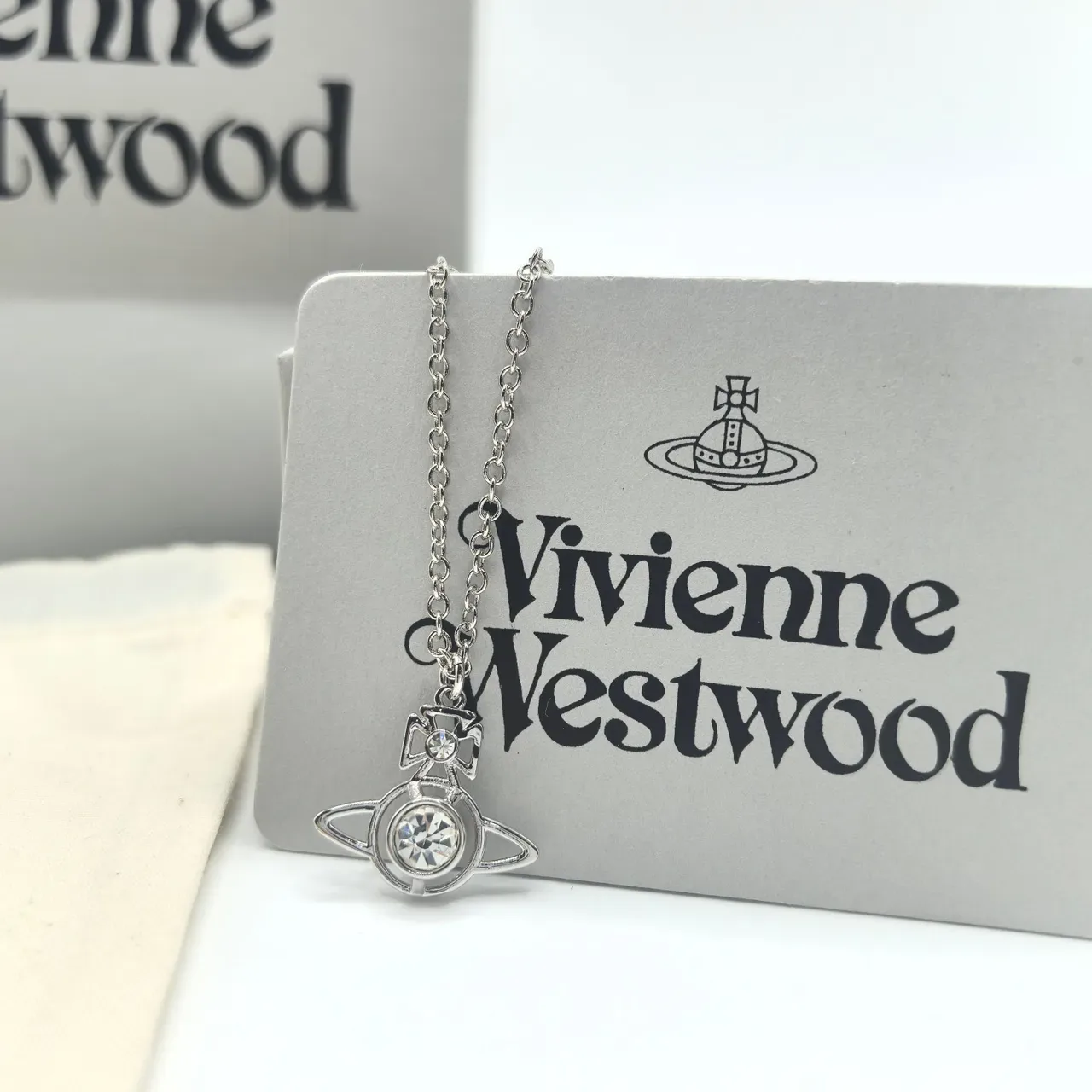 Vivienne Westwood Orb Pendant Necklace Rose Gold Pink Crystal and Silver Clear Crystal Necklaces 4