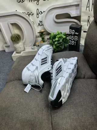 Adidas Black and White Three-Stripe Lifestyle Sneakers 6