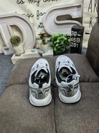 Adidas Black and White Three-Stripe Lifestyle Sneakers 8