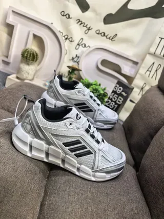 Adidas Black and White Three-Stripe Lifestyle Sneakers 9