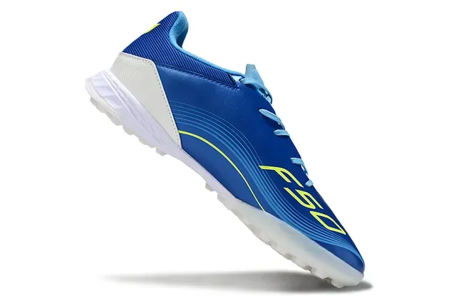 Adidas नील हलुद लो-कट सिन्थेटिक अपर डायनामिक वेव ग्राफिक टर्फ फुटबॉल जूते 2