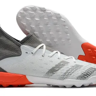 Adidas Zapatos de fútbol gris naranja con cuello de punto ajustado al tobillo texturizado sintético con jaula en la puntera para césped