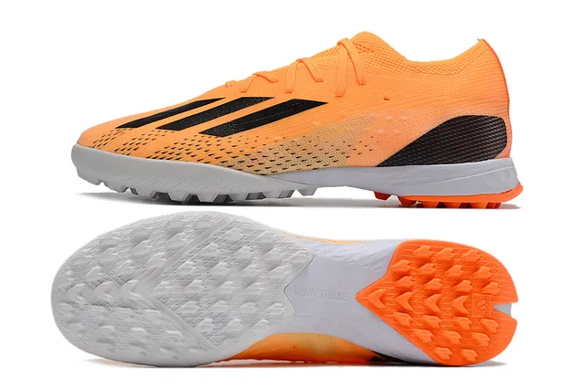 Adidas Chaussures de football orange noir avec empeigne en maille, branding latéral à trois rayures et pour gazon artificiel 6
