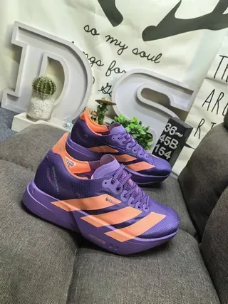 Adidas Purple and Orange Three-Stripe Platform Lifestyle Sneakers 9
