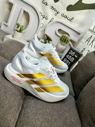Adidas White and Gold Three-Stripe Running Shoes 9