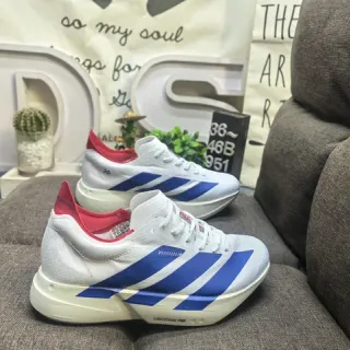 Adidas Chaussures de course à tige en maille blanche et bleue, low-top