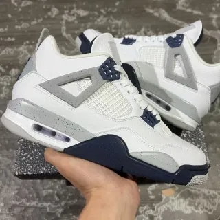 Air Jordan 4 白色海军蓝泼墨篮球鞋