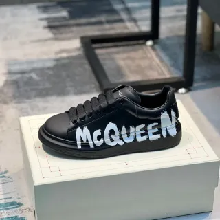 Alexander McQueen Oversized Sneaker Black White Platform Sole Graffiti-Style Logo Lifestyle Sneakers