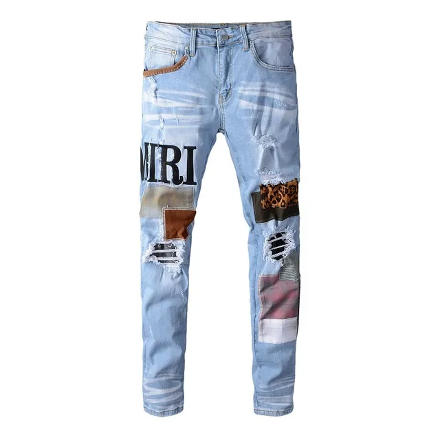 Amiri Patchwork Distressed Logo Jeans 11