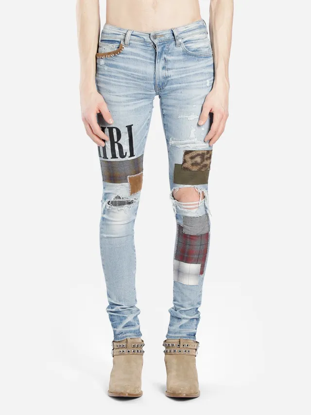 Amiri Patchwork Distressed Logo Jeans 14