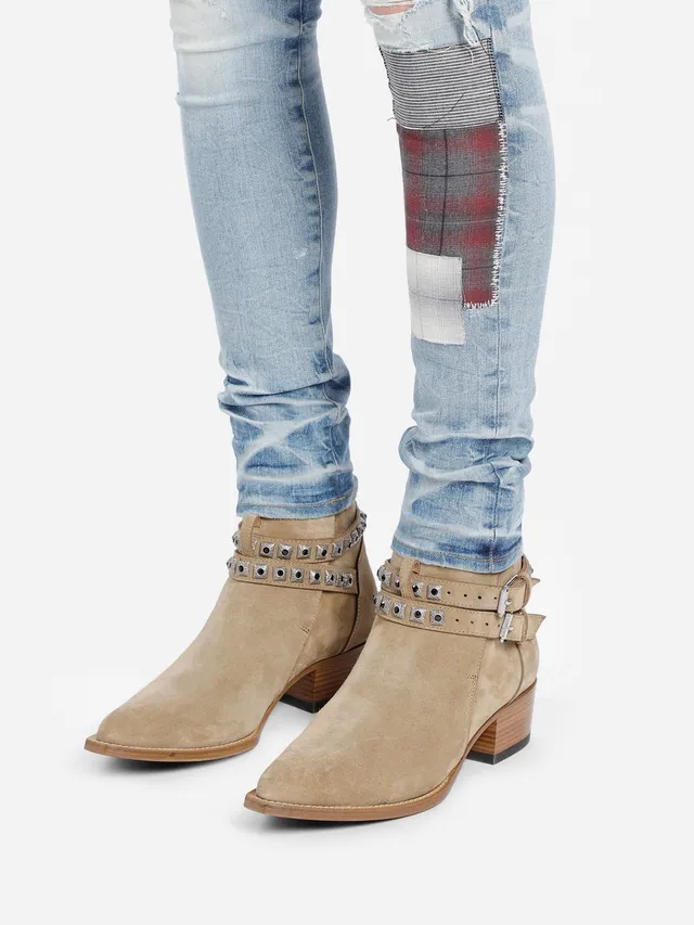 Amiri Patchwork Distressed Logo Jeans 16