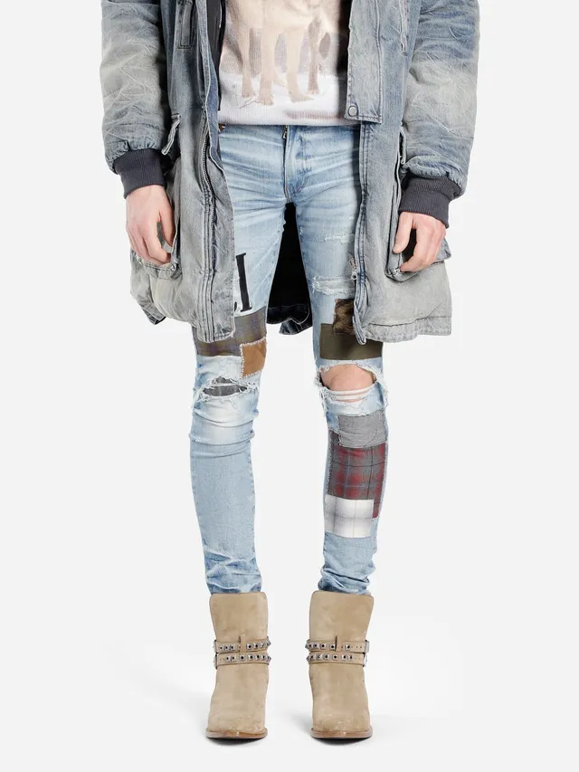 Amiri Patchwork Distressed Logo Jeans 19