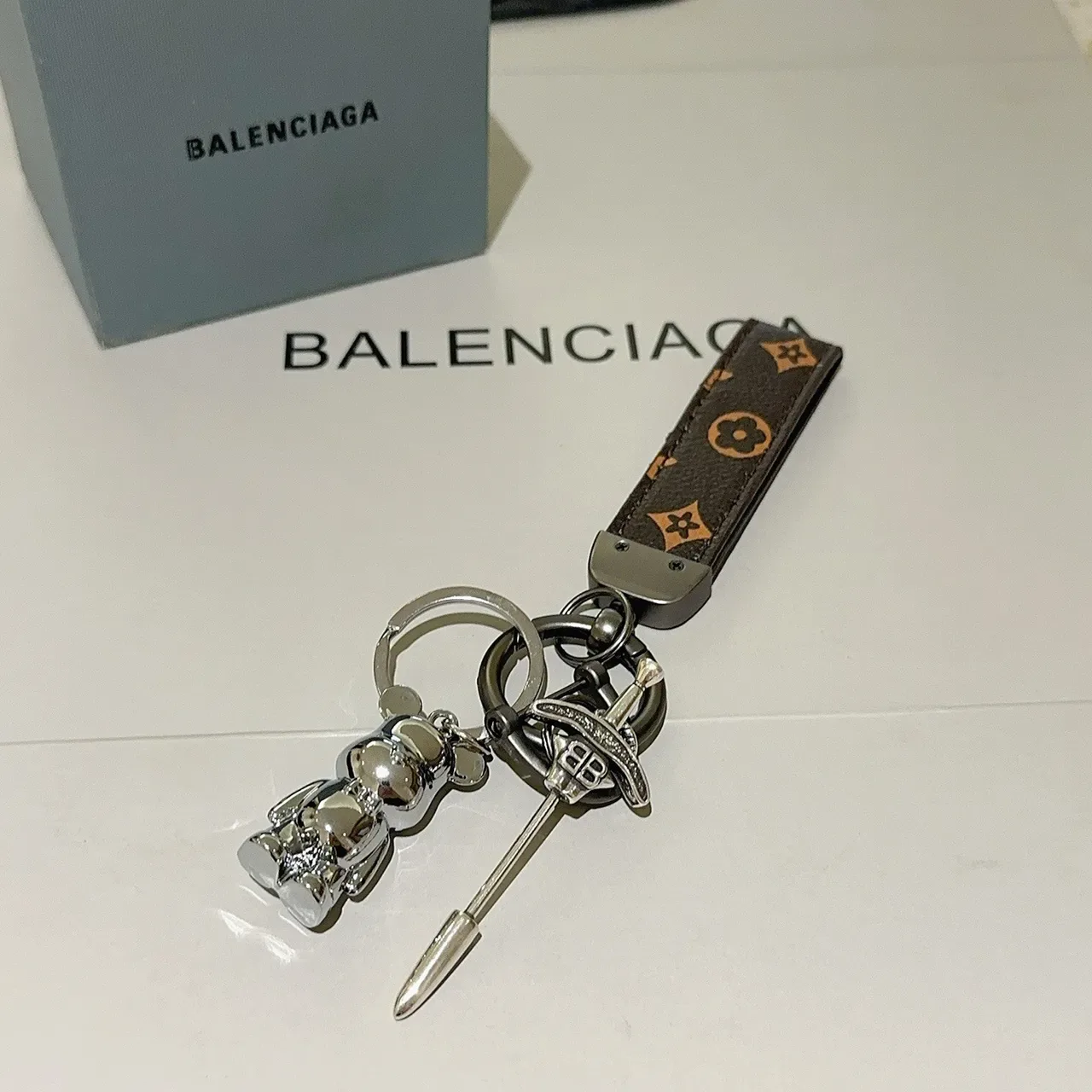 Balenciaga Bear Keychain Brown Silver Monogrammed Leather Strap Polished Metal Charm Phone Case 3