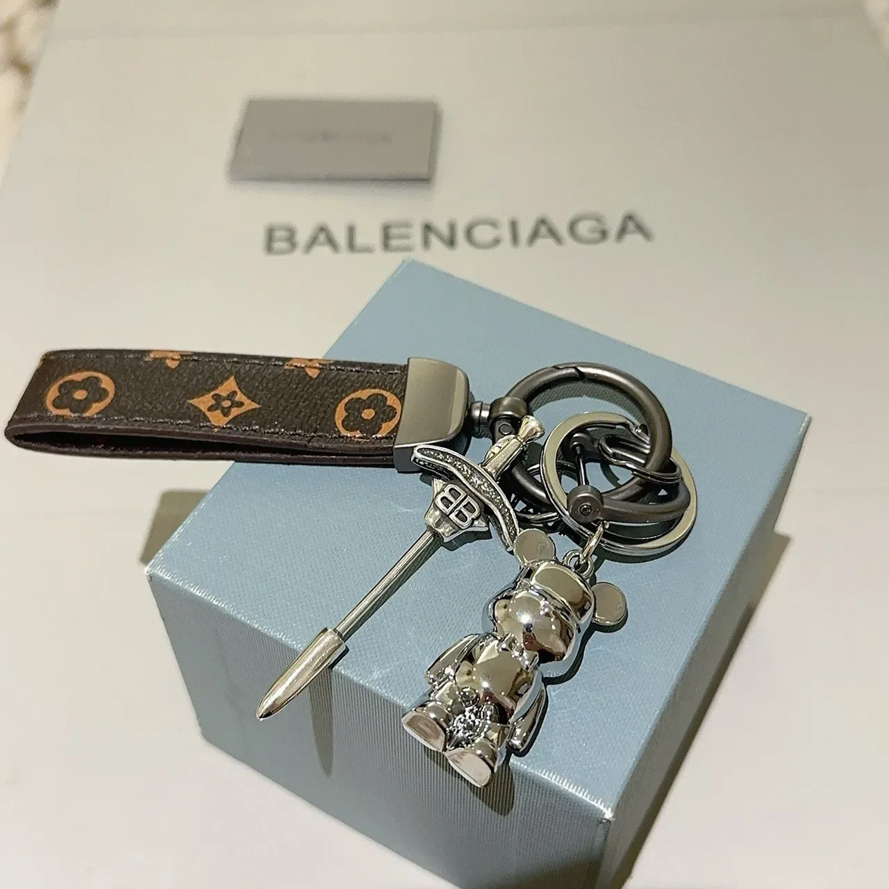 Balenciaga Bear Keychain Brown Silver Monogrammed Leather Strap Polished Metal Charm Phone Case 4