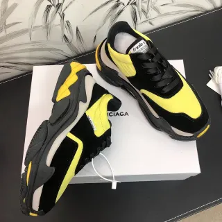 Balenciaga Triple S أسود وأصفر حذاء رياضي كبير