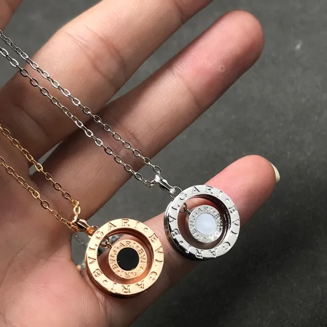 Bvlgari B.zero1 সোনা রূপা কেন্দ্রিক ডাবল রিং পেন্ডেন্ট খোদাইকৃত ব্র্যান্ড লেটারিং নেকলেস 2