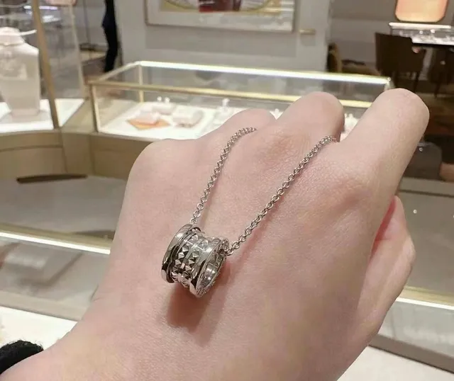 Bvlgari B.zero1 Rock Silver Tubogas-Inspired Cylindrical Pendant Multi-Ring Stack Construction Necklace 4