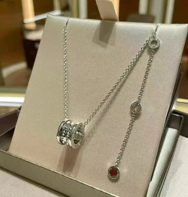 Bvlgari B.zero1 Rock Silver Tubogas-Inspired Cylindrical Pendant Multi-Ring Stack Construction Necklace 5