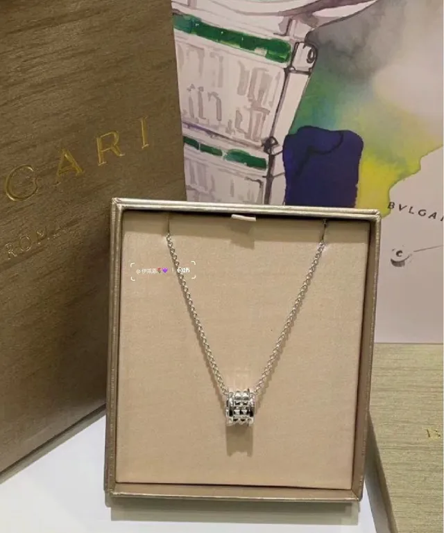 Bvlgari B.zero1 Rock Silver Tubogas-Inspired Cylindrical Pendant Multi-Ring Stack Construction Necklace 6