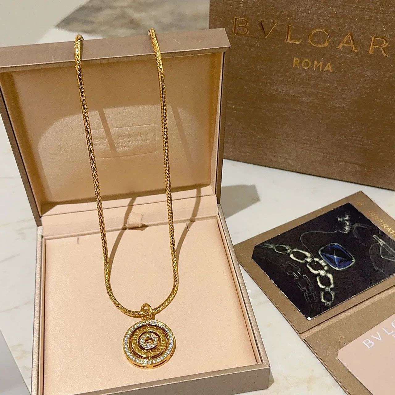 Bvlgari Chaîne tressée en or et argent collier avec pendentif spirale à plusieurs niveaux 9