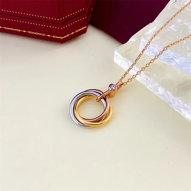 Cartier Trinity Tricolor Gold Diamond Accent Necklace 1
