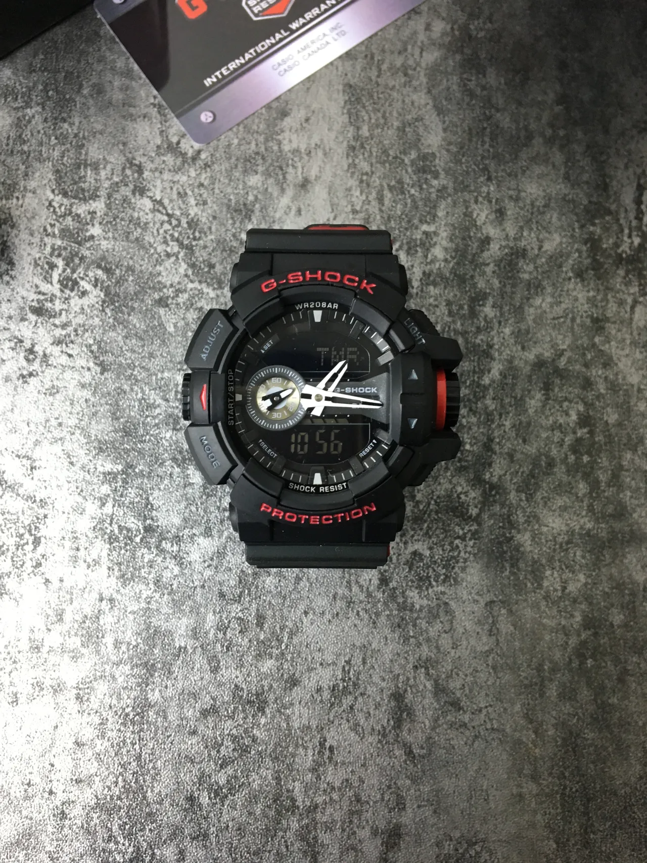 Casio G-Shock GA-100 Noir et Rouge Montre Sportive Analogique-Digitale Robuste 3