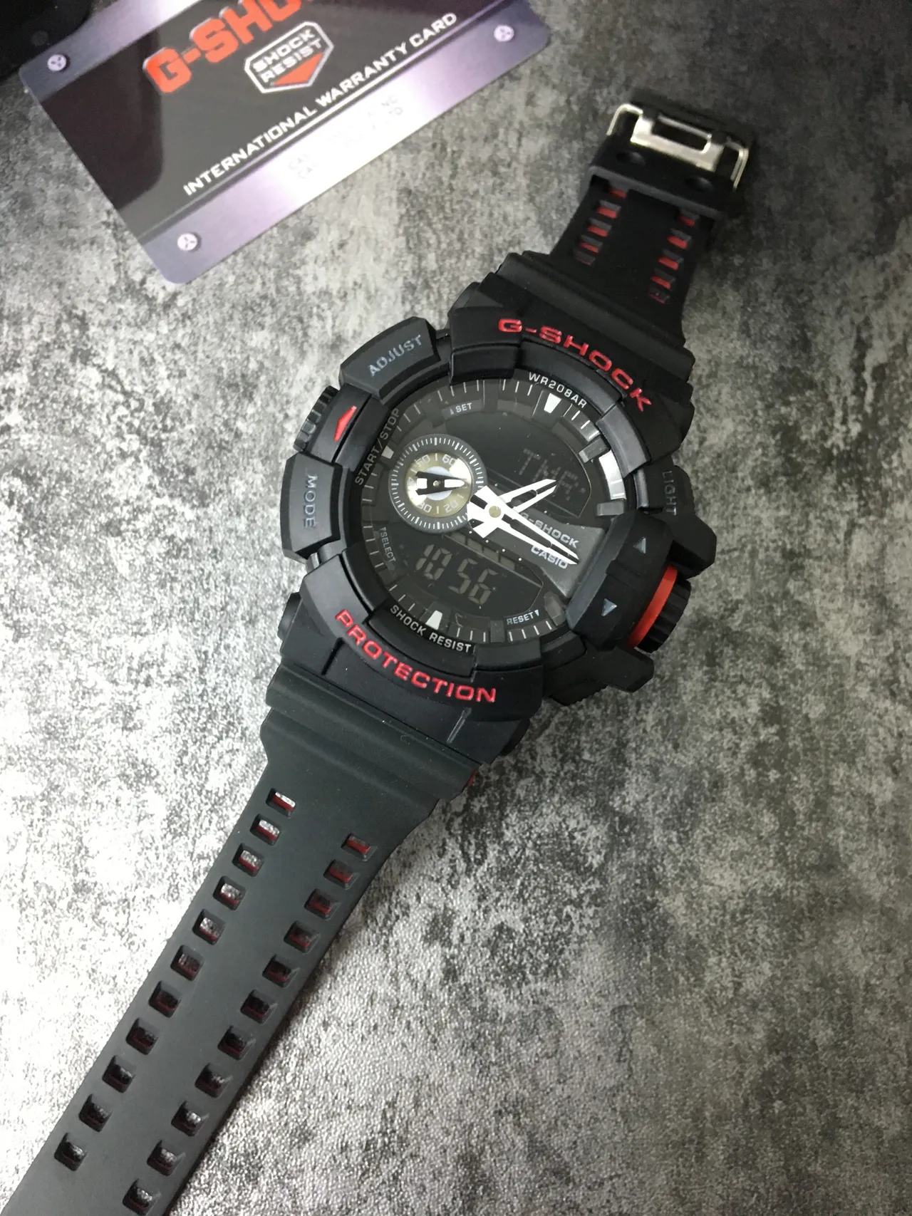 Casio G-Shock GA-100 Noir et Rouge Montre Sportive Analogique-Digitale Robuste 7