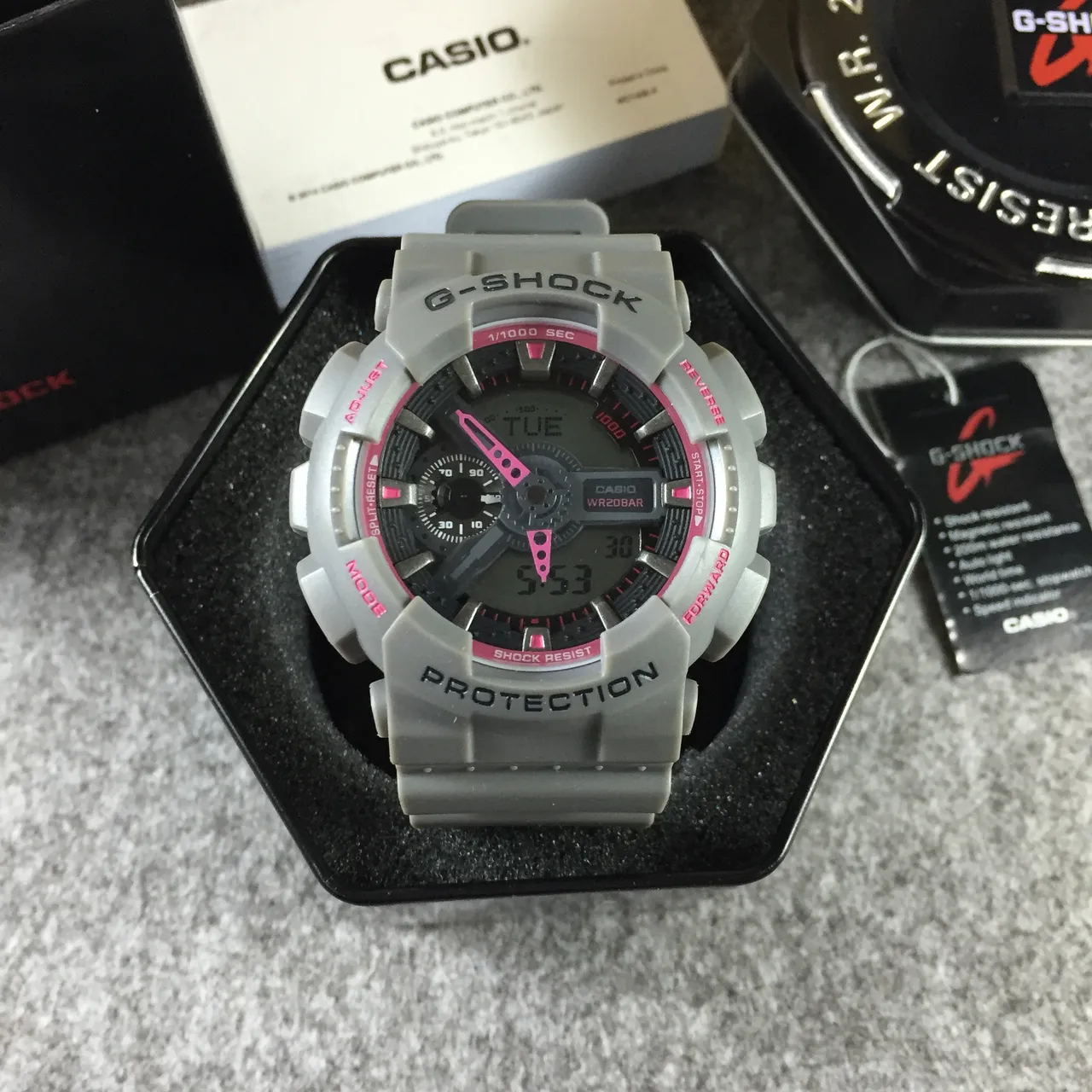 Casio G-Shock GA-100 Gris et Rose Montre Sport 12