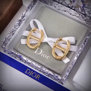 Boucles d'oreilles Dior Addict Créoles Dorées et Blanches en Forme de D Motif Interlocking