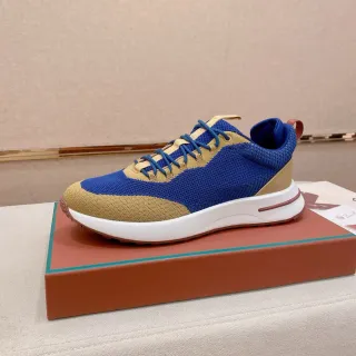 أحذية رياضية أزرق وبيج ثنائية اللون محبوكة مع upper مصمم و midsole أبيض