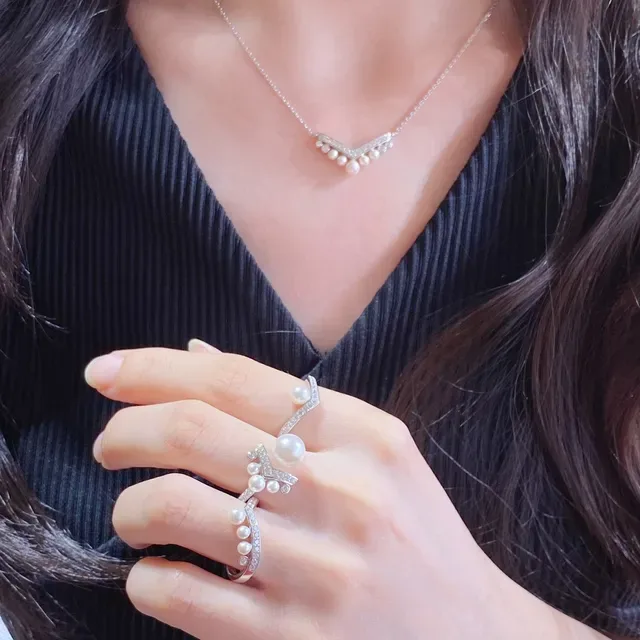 Chaumet Joséphine Asymmetrical Pearl and Diamond Ring 9