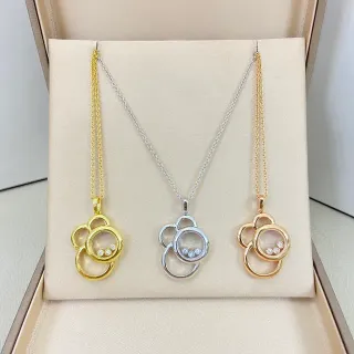 Collier pendentif circulaire en or et argent entrelacé avec chambre de cristal flottante