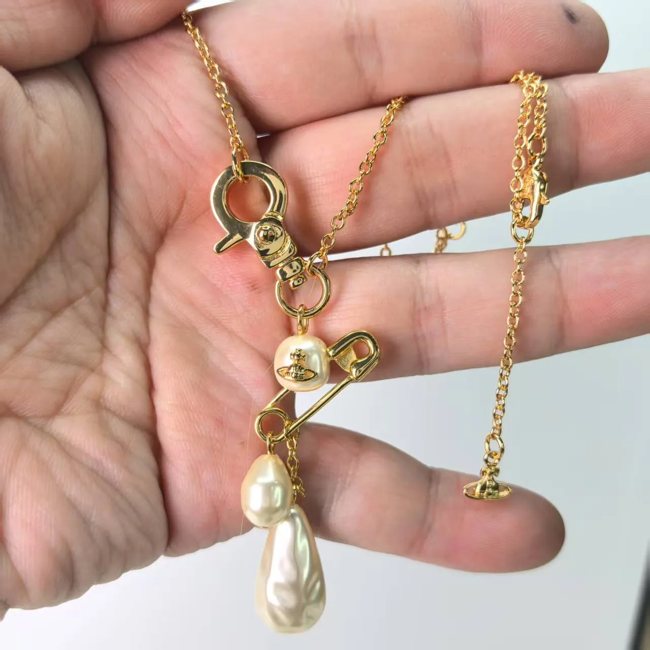 Gold-Tone and Silver-Tone Safety Pin Baroque Pearl Drop Necklaces 4