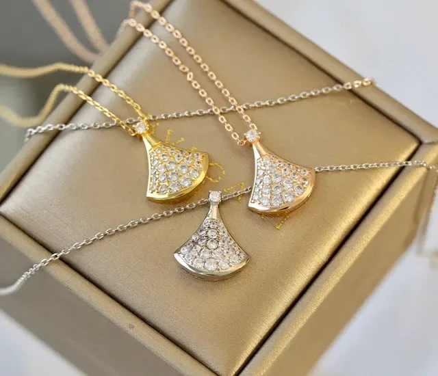 Gold-Tone Fan-Shaped Pavé Stone Pendant Necklace 8