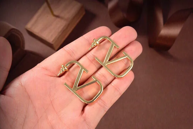 Gold-Tone Geometric V Motif Open Hoop Earrings 7