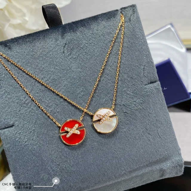 Collier X-Bar avec perle mère de ton doré 2